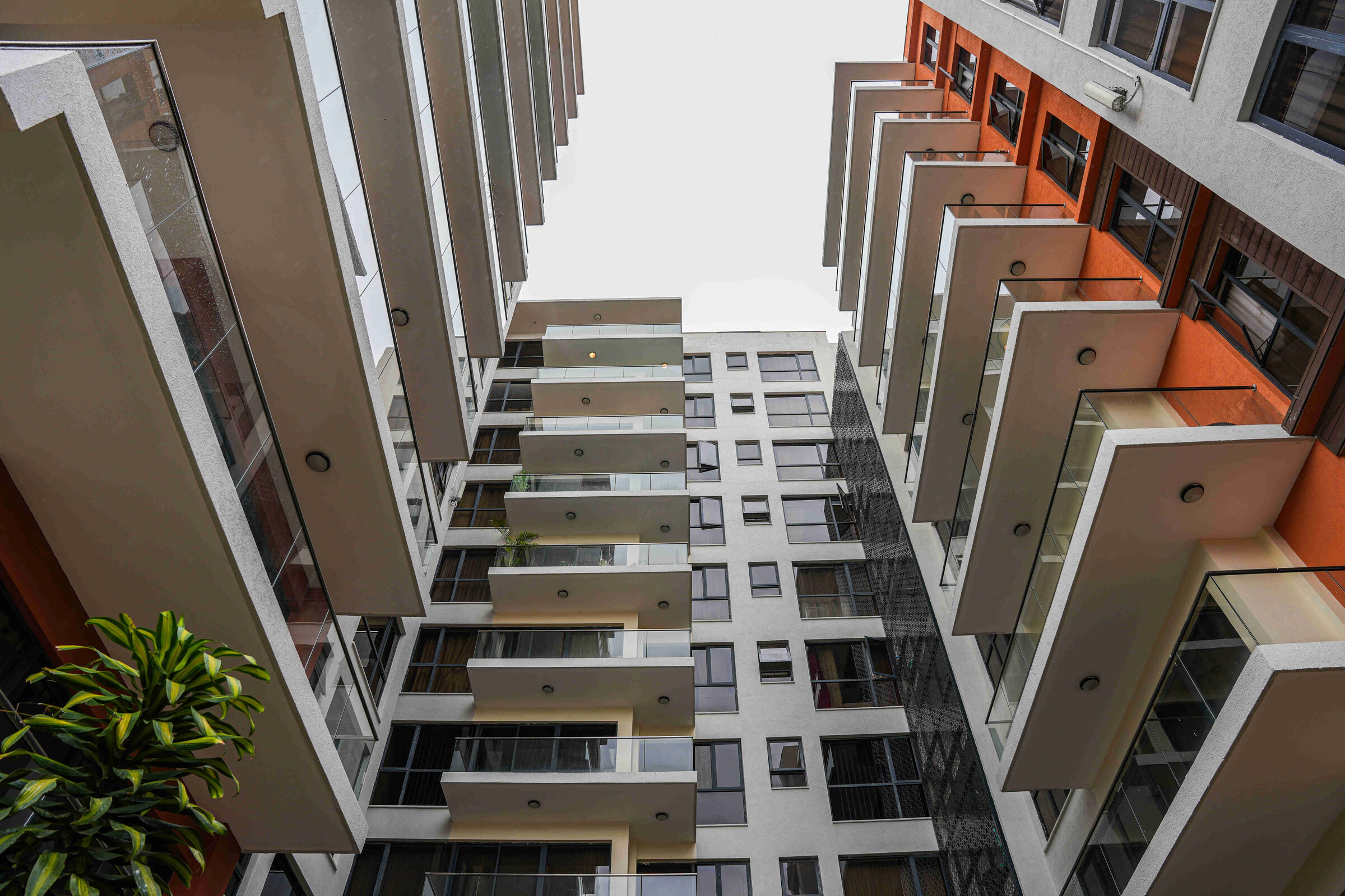Looking up through ten floors of cantilevered balconies at 5th Park Heights